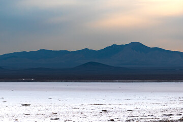Azure Mountains Salt Lake and sunlight behind the clouds