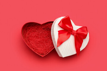 Gift box for Valentine's Day on red background