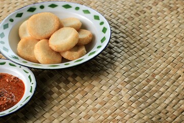 Ulen Ketan, Indonesian Traditional Snack Made from Steam Sticky Rice, Compressed or Shaped and then Deep Fried, Served with Sambal Oncom