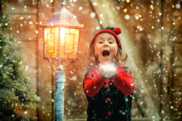 elf enjoying snowfall