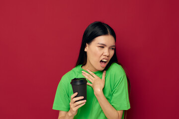 woman in green t-shirt black glass posing