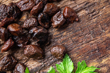 olive pitted dried smoked olives healthy meal food snack on the table copy space food background