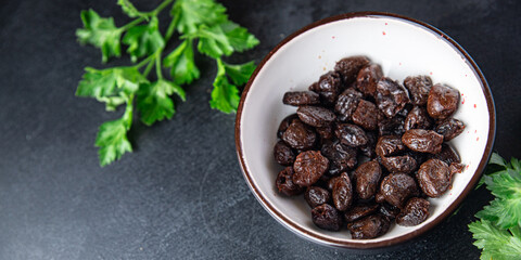 olive pitted dried smoked olives healthy meal food snack on the table copy space food background