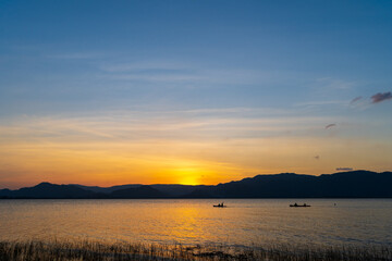 Fototapeta na wymiar Beautiful sunset at Timah Tasoh Lake in Perlis, Malaysia