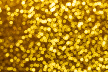 bokeh defocused lights with gold abstract background