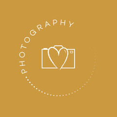 White photography stamp logo on a yellow coloured background. Wedding photographer logo. With love camera icon. Romantic logo design. Hand drawn stamp icon.
