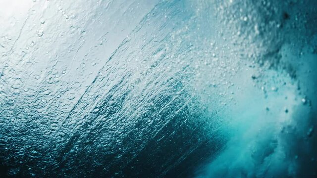 Ocean wave. Crystal clear ocean wave breaks right on camera in Maldives