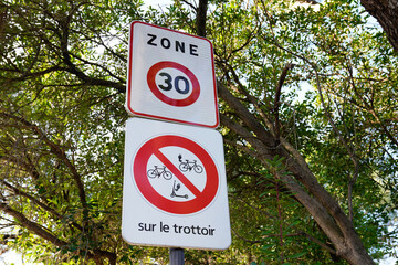 Electric Scooter E-Scooter forbidden banned and prohibited sign with french text sur le trottoir...