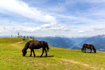 A beautiful view of Kronplatz (Plan de Corones) with mountain range in background