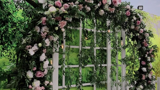 round green wedding arch of flowers close up