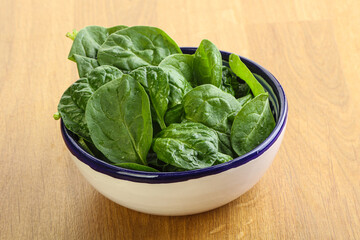 Fresh green spinach leaves in the bowl