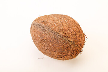 Tropical brown coconut over background