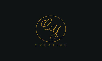 CY is a stylish logo with creative design and golden color with black background.