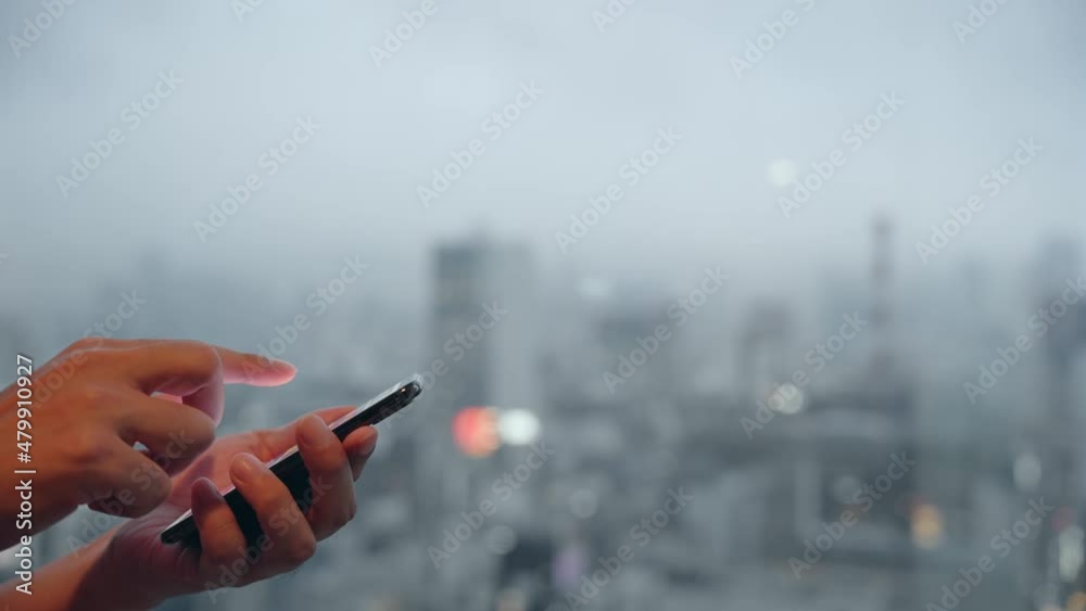 Poster people using a smart phone in front of the city.