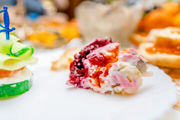Traditional Russian salad with beetroot and salted herring for the New Year