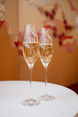two wedding glasses with champagne close up