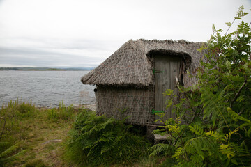 Fototapeta na wymiar Waterfront bird-watching shed in Craob Haven, Scotland