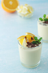 Orange lemon citrus milk mousse in glasses