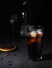 Cold coffee with ice in low key