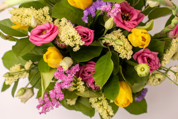 Beautiful multicolored flowers close-up on background. Greeting card, mom's day, wedding invitation, birthday. Copy of the place.