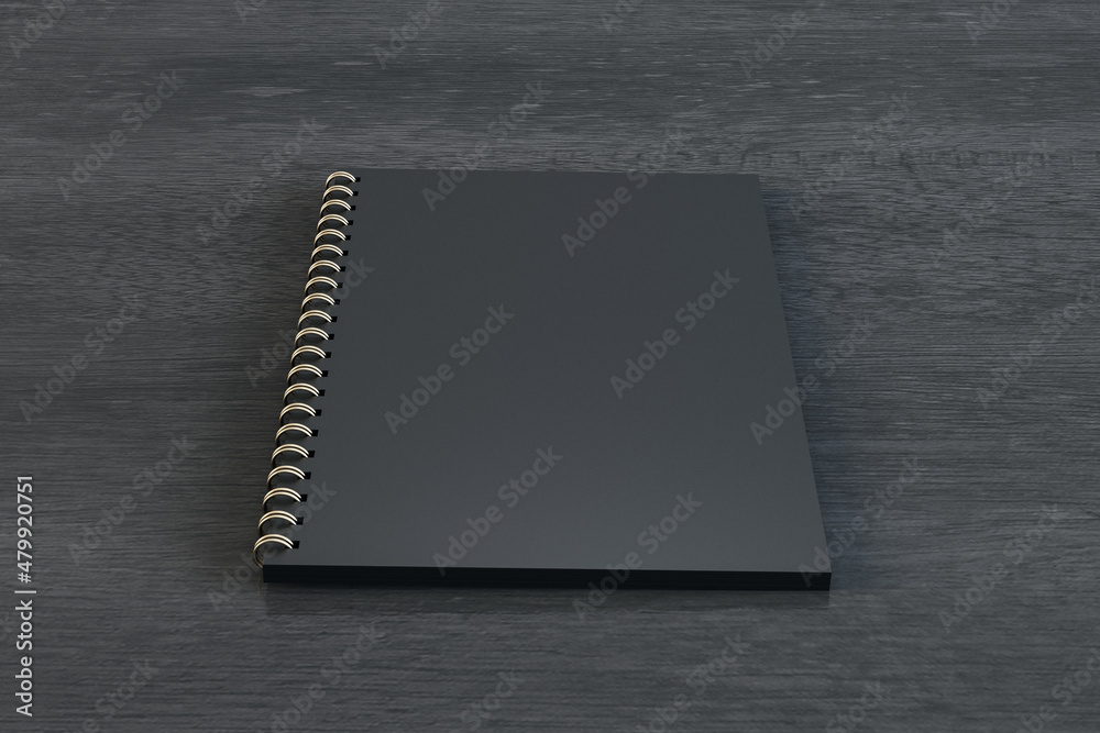 Poster close up of empty black spiral notepad on dark wooden background. mock up, 3d rendering.