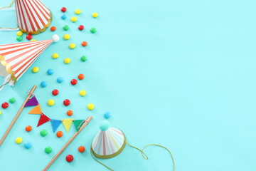 Party colorful image over blue background . Top view, flat lay