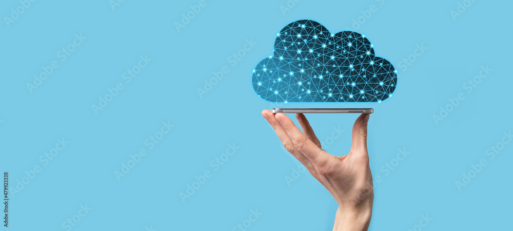 Wall mural businessman hold cloud icon.cloud computing concept - connect smart phone to cloud. computing networ