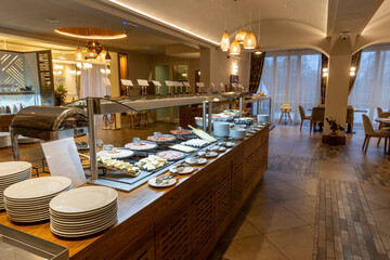 Appetizers and salad served on a buffet table in the restaurant
