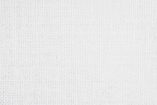 White fabric jute hessian sackcloth canvas woven gauze texture pattern in light white color blank. Natural linen and cotton cloth texture as clean background empty for decoration.