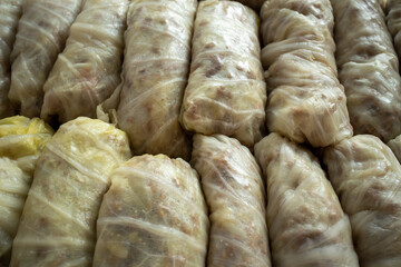 Homemade Sarma, tuffed cabbage rolls. Traditional balkan food. - obrazy, fototapety, plakaty
