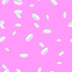 White pills on a colored background. Pattern.