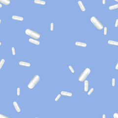 White pills on a colored background. Pattern.