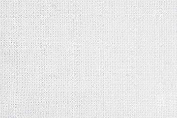 White fabric jute hessian sackcloth canvas woven gauze texture pattern in light white color blank. Natural linen and cotton cloth texture as clean background empty for decoration.