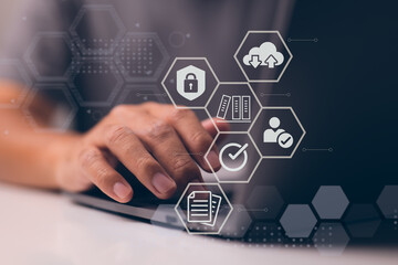 Businessman employing a computer to document management, online documentation database technology,...