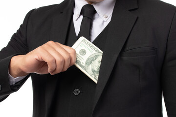 Close up hand business man in black suit put or take out money in pocket isolated on white background. Concept of finance success. Copy space.