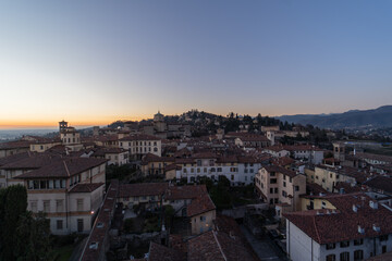 Fototapeta na wymiar San Vigilio hill in Bergamo upper city at sunset.