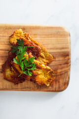 vegan fried bread crumbed zucchini slices, healthy plant-based food