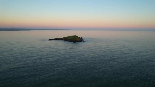 Capel Island in county Cork, Ireland, at sunset on a calm winter day
