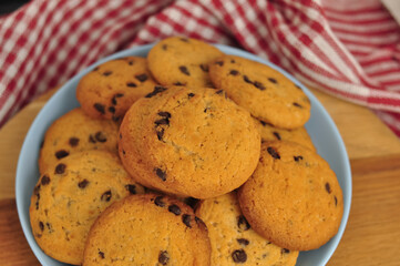 sweet crunchy cookies with dark chocolate for teatime