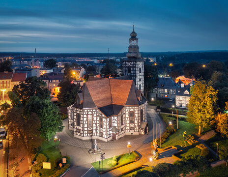 Milicz, Poland.  Aerial view of Half-timbered church of Saint Andrew Bobola at dusk
