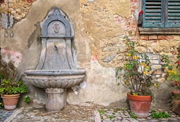 Ancient Fountain in a Medieval Village in Italy