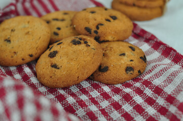 sweet crunchy cookies with dark chocolate for teatime