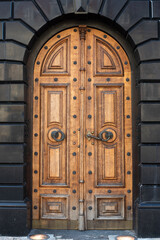 old wooden door entrance of the church in  Warsaw old town