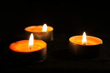 three burning candles