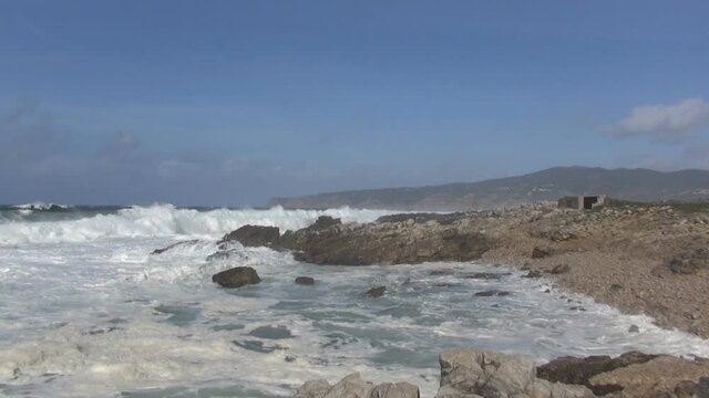 High tide, high waves, atlantic ocean, storm, shipwreck, rocky coastline, sea foam, spray, gibraltar coast, volcanic coast, sunny weather by the sea