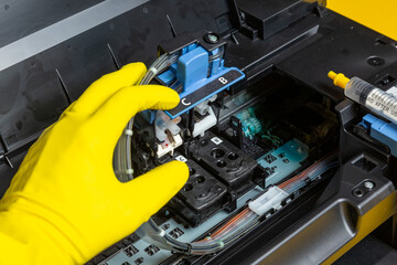reactivate dried printer cartridges with cleaner and a syringe