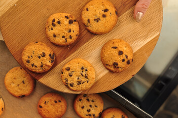 Obraz na płótnie Canvas sweet crunchy cookies with dark chocolate for teatime