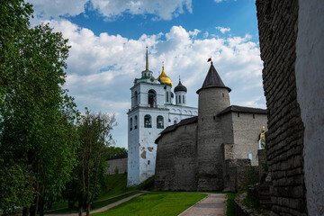 Medieval fortress tower. Ancient castle. Historical and architectural center of the 12th century in the old city, Russia. Medieval fortress and temple complex. Travel summer tourism holiday vacation.