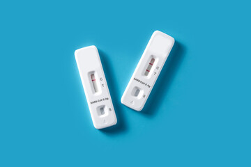 Covid-19 rapid antigen test on blue background