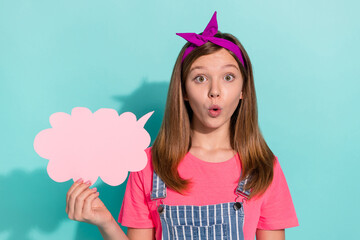 Portrait of impressed person hold cloud figure paper pouted lips isolated on teal color background